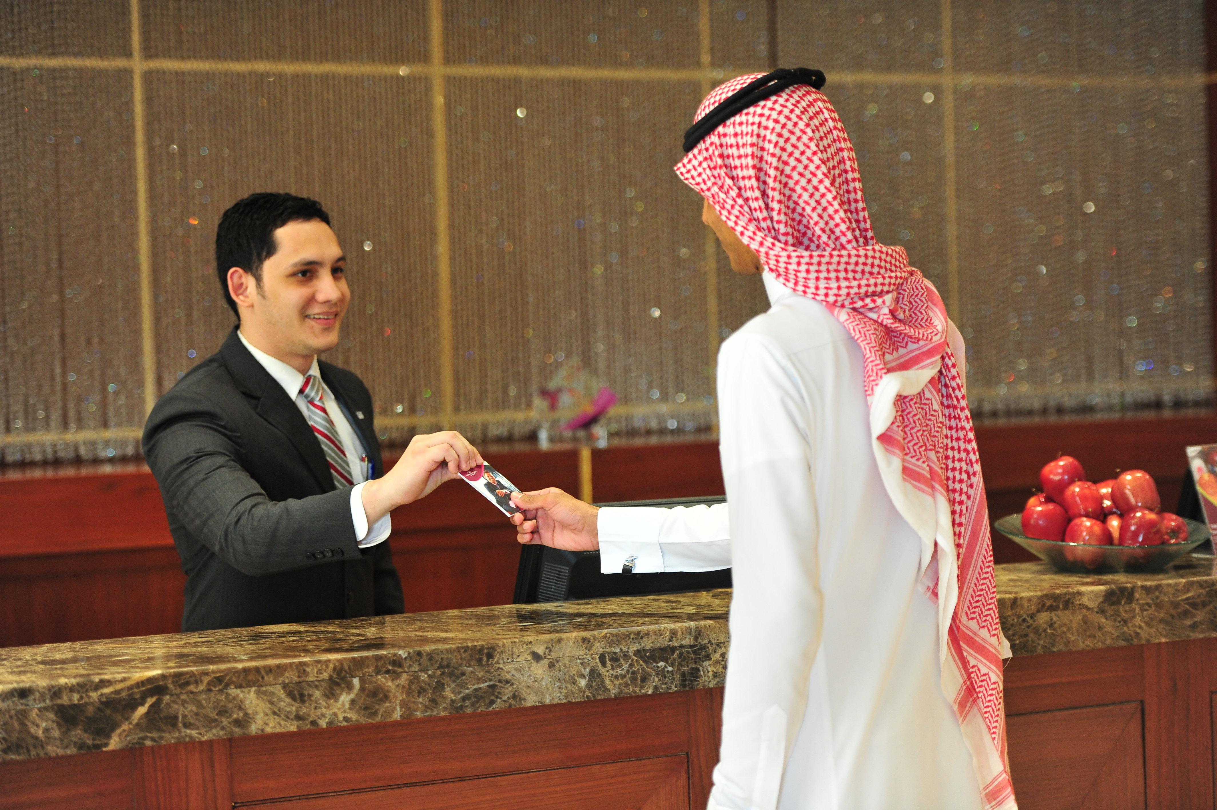 Crowne Plaza Al Khobar By Ihg Hotel Exterior photo A hotel receptionist